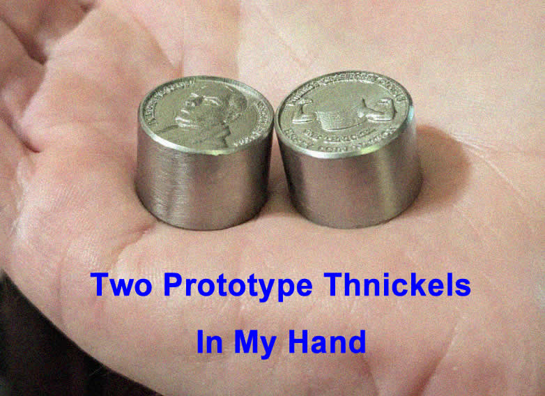 holding two thick coins